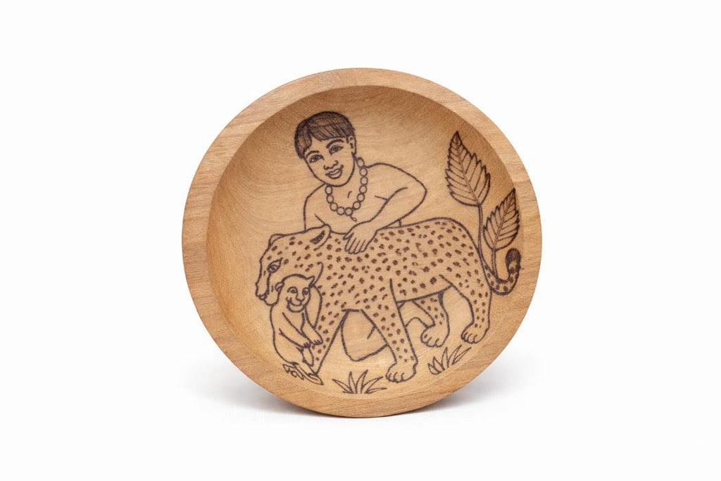 Plate with jaguar graffiti.